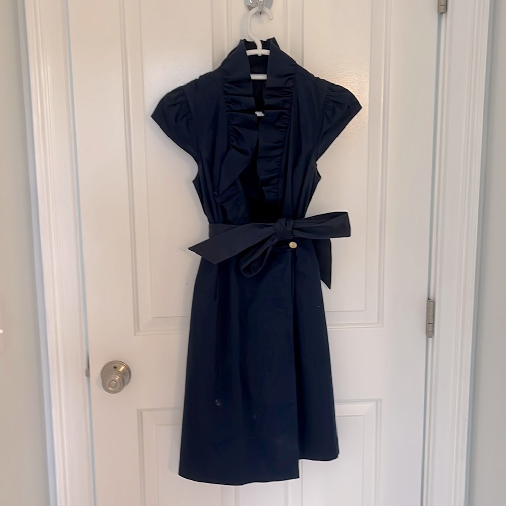 Fabulous designer dress and a real stunner! Great for career or a night out.